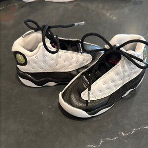 Kids Jordan  Black and White Sneakers